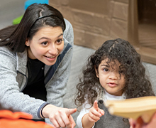 A behavior technician works with a client