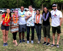 group of people in Hawaiian attire