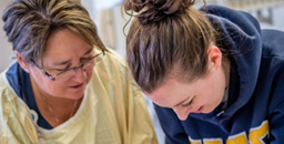 A student and a researcher work together