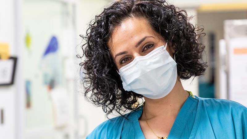 A nurse looks at the camera at Seattle Children's